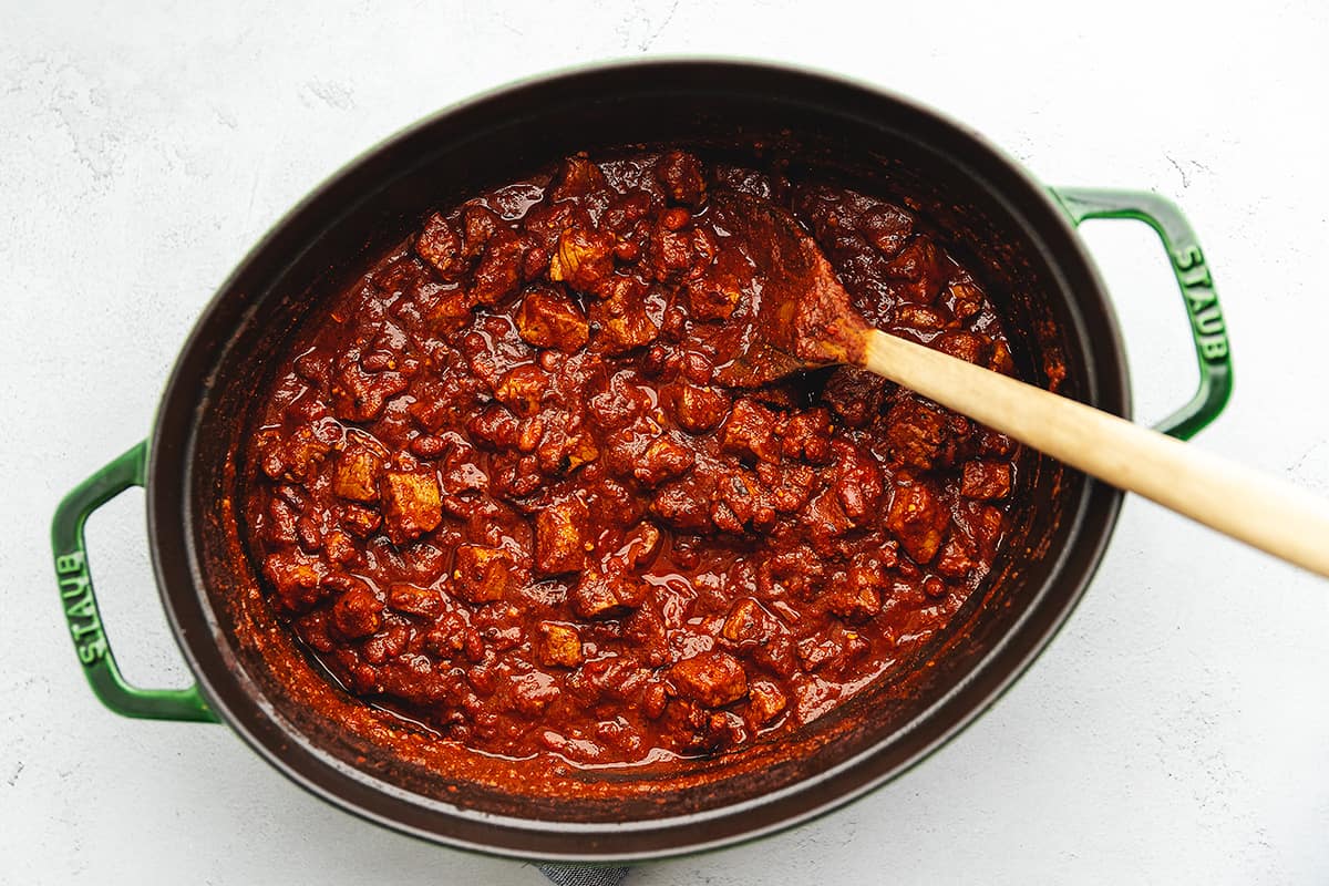 chili with steak in a dutch oven