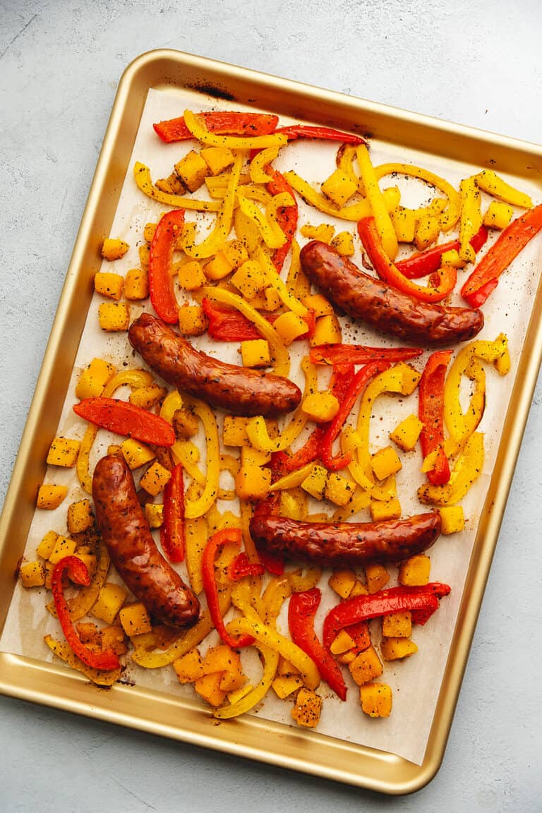 andouille sausage and peppers on a sheet tray