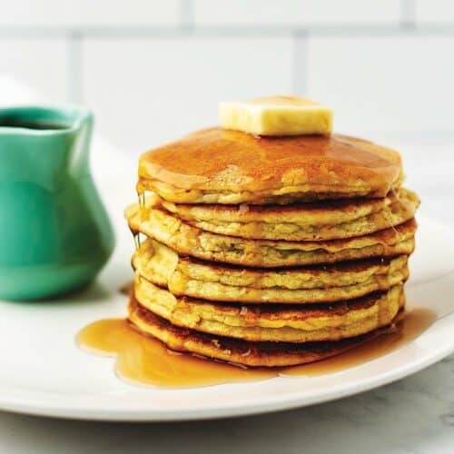 a stack of keto pancakes on a white plate