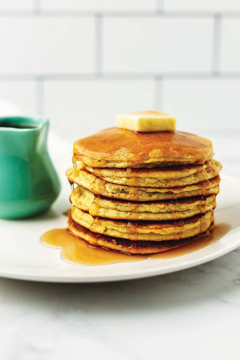 a stack of keto pancakes on a white plate