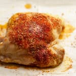 a boneless chicken thigh with seasonings