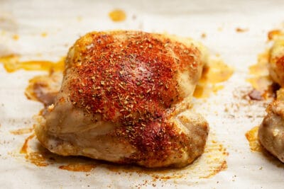 a boneless chicken thigh with seasonings