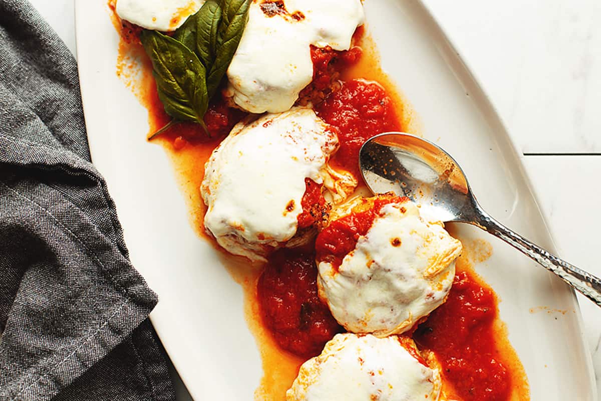 cooked chicken parmesan on a platter