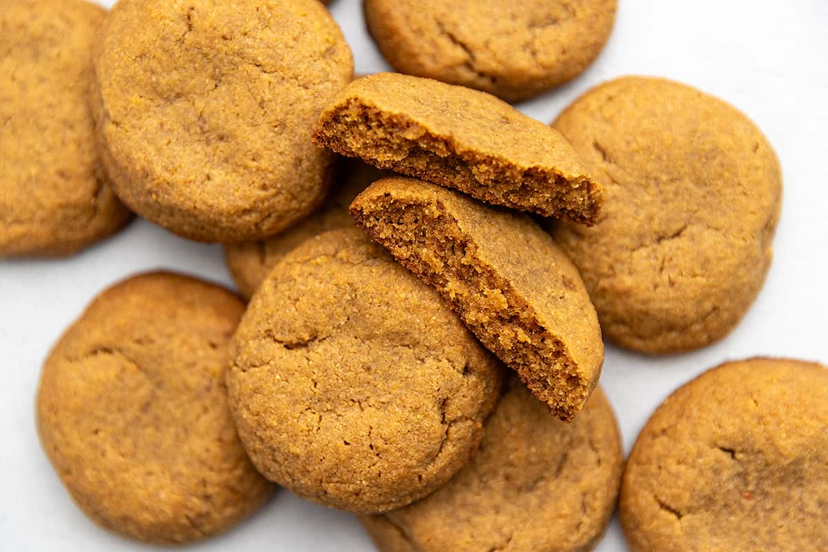 soft and thick peanut butter stacked on a blue background