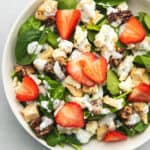 a bowl full of strawberry chicken salad