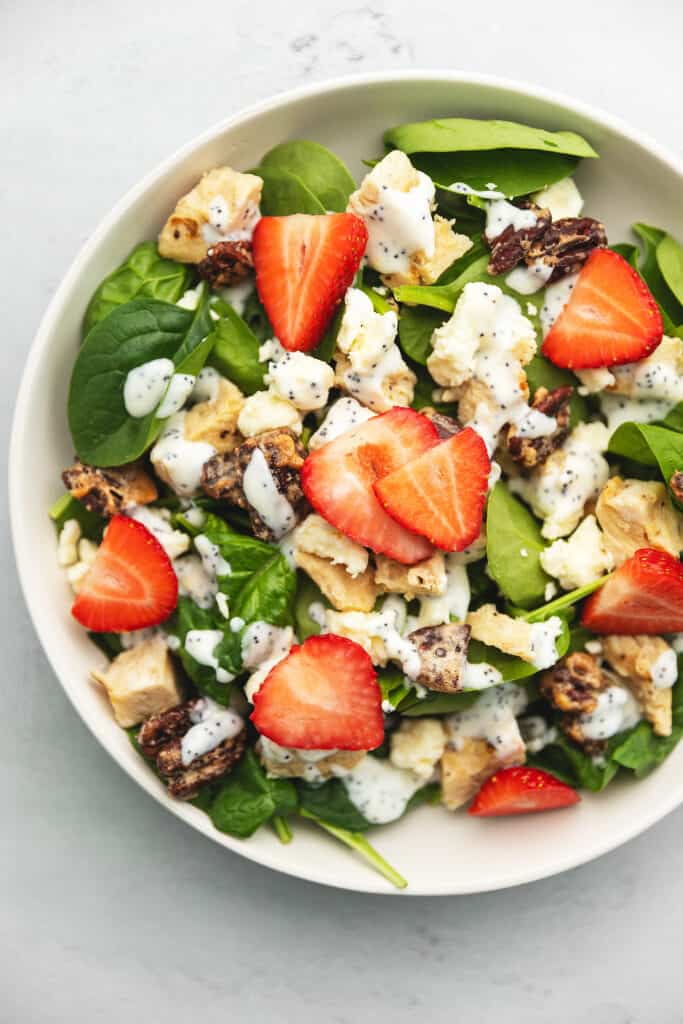 a bowl full of strawberry chicken salad