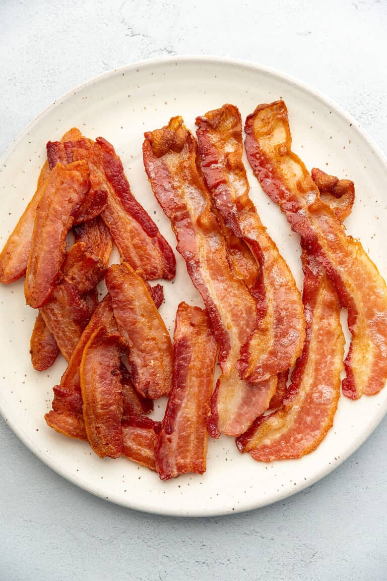 crispy bacon on a white plate