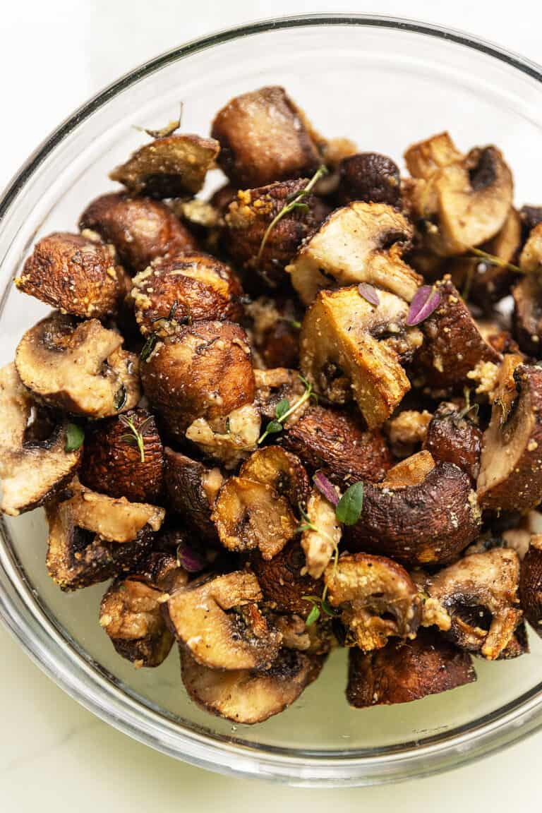 cooked mushrooms in a glass bowl