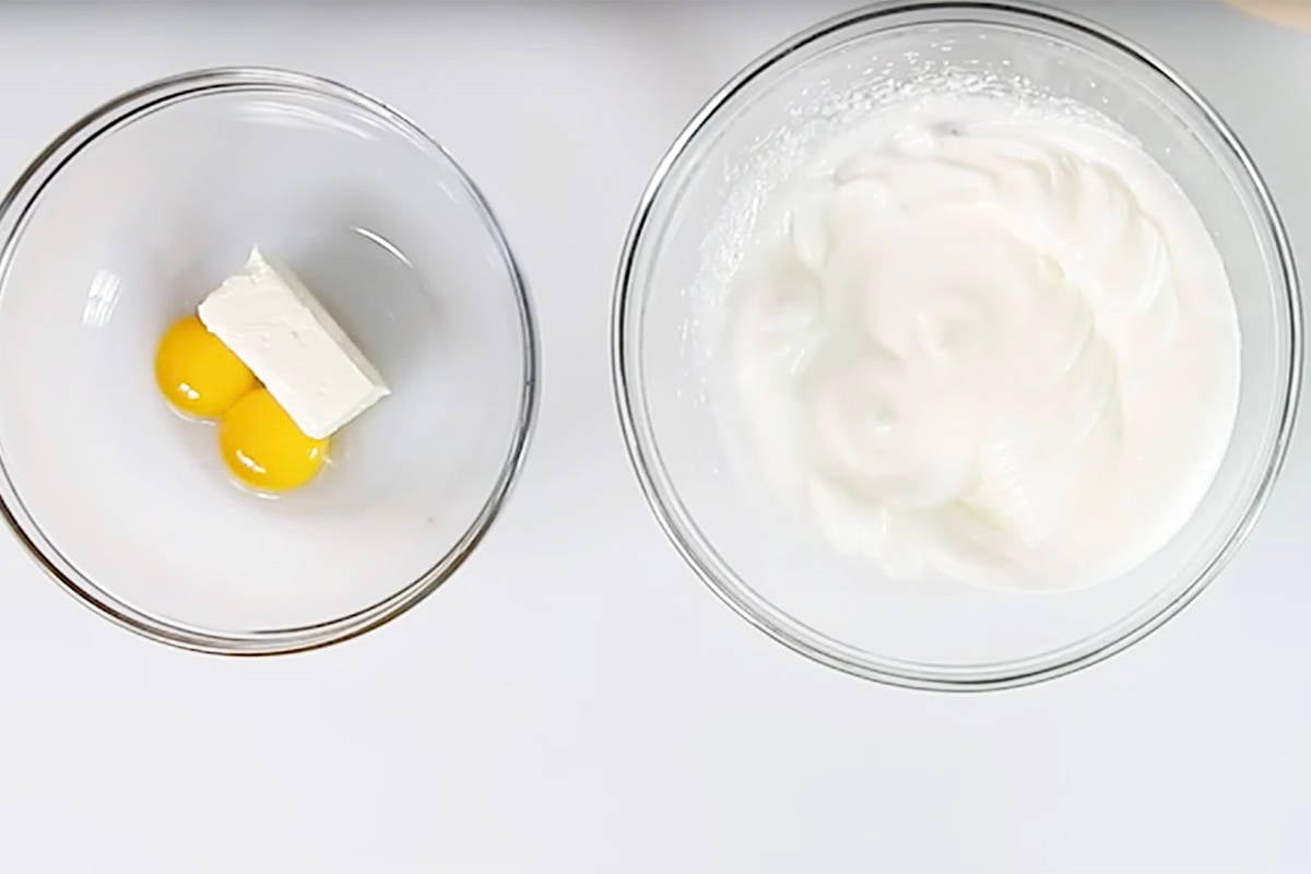 2 glass bowls with whipped egg whites for cloud bread