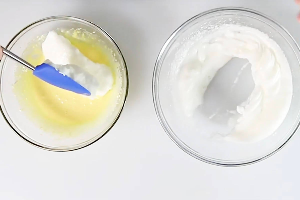 adding the cream cheese mixture to egg whites for cloud bread