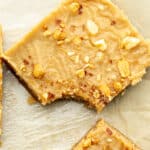 a bite taken out of a keto peanut butter bar