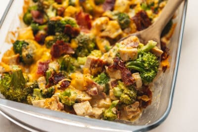 a casserole dish with a bacon and broccoli casserole