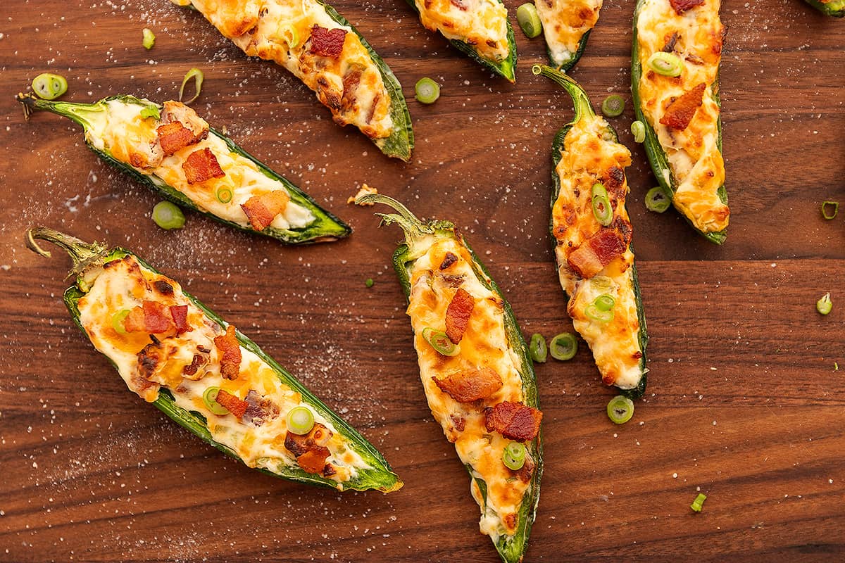air fryer jalapeno poppers on a wooden cutting board