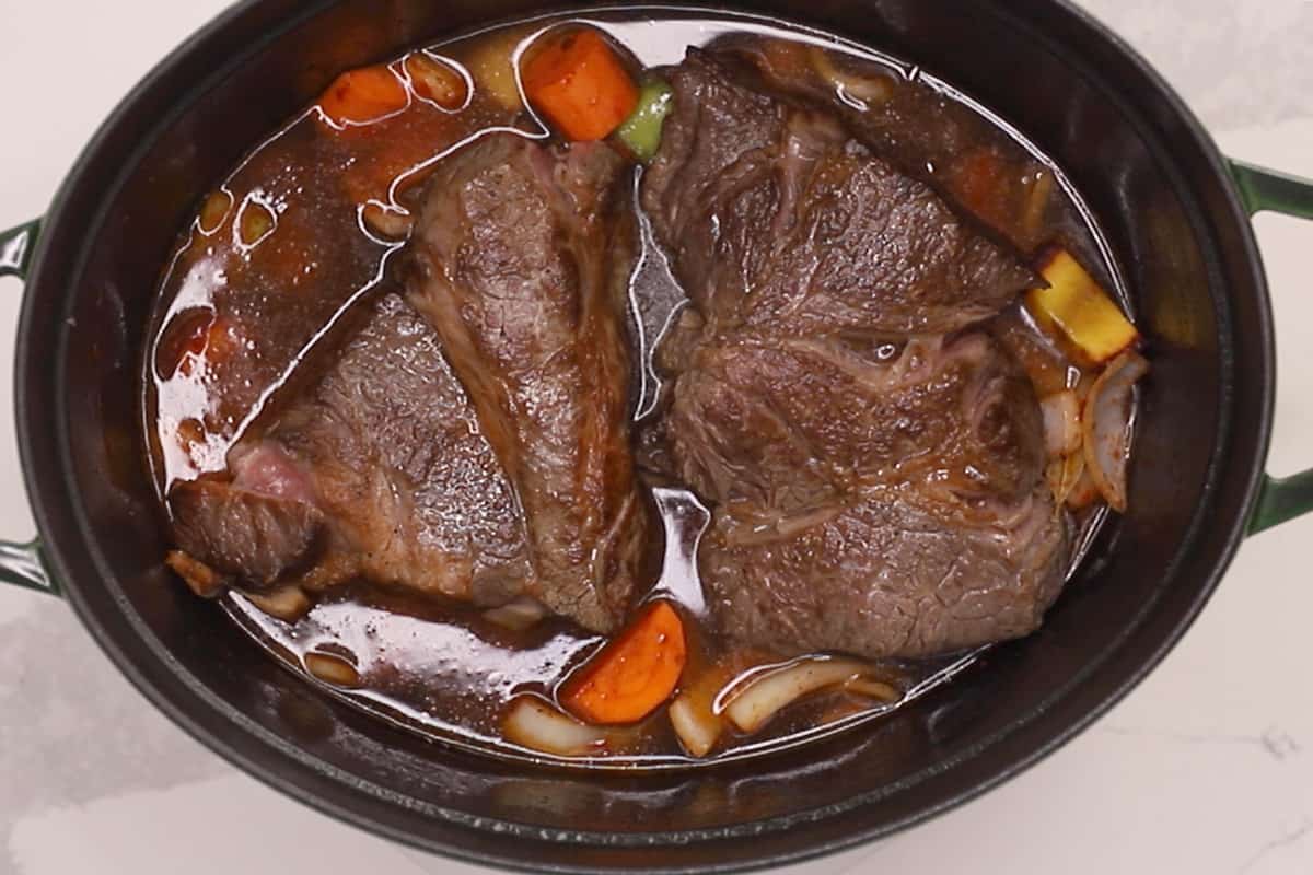 pot roast braising in a dutch oven