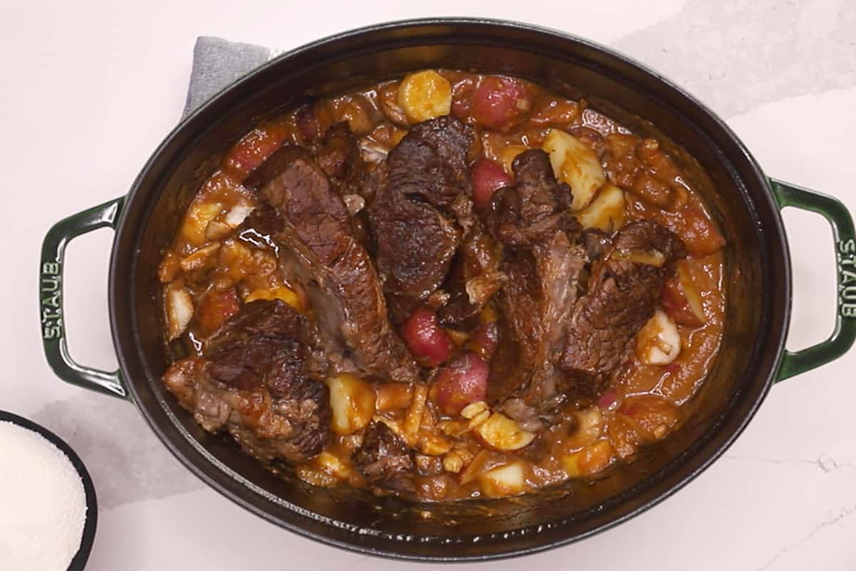pot roast with vegetables in a dutch oven