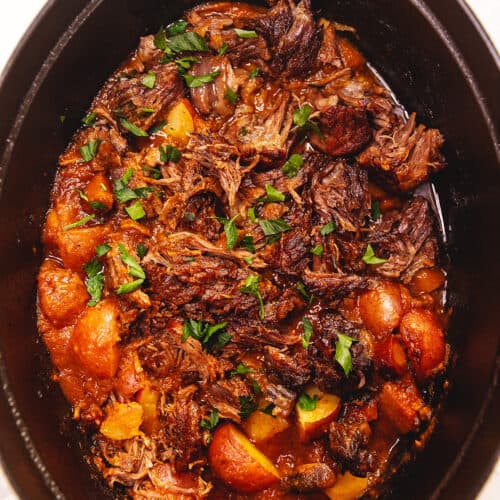 pot roast with potatoes in a dutch oven
