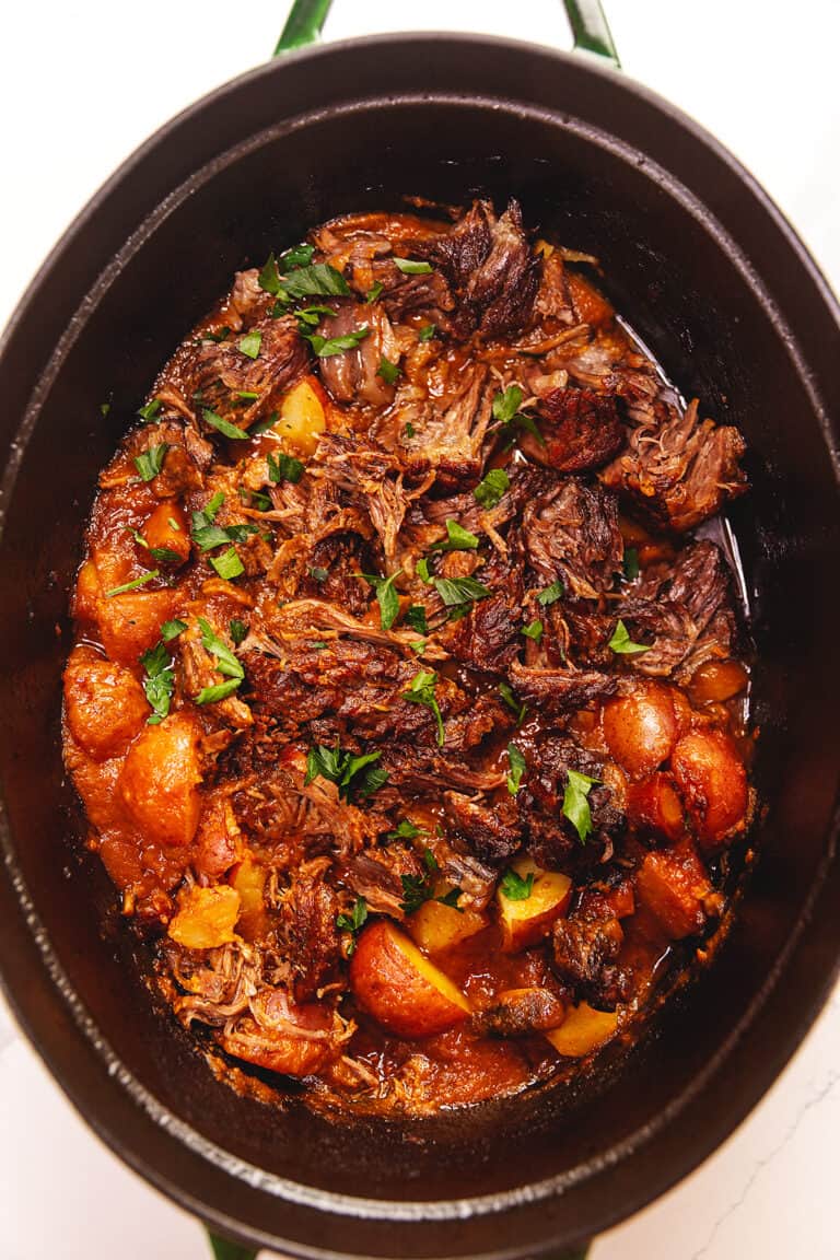 pot roast with potatoes in a dutch oven