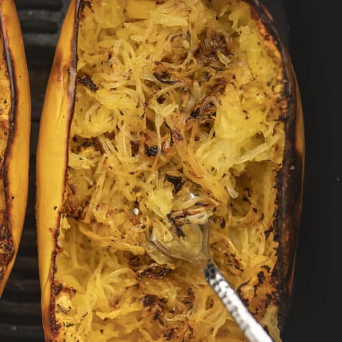 cooked spaghetti squash in an air fryer basket