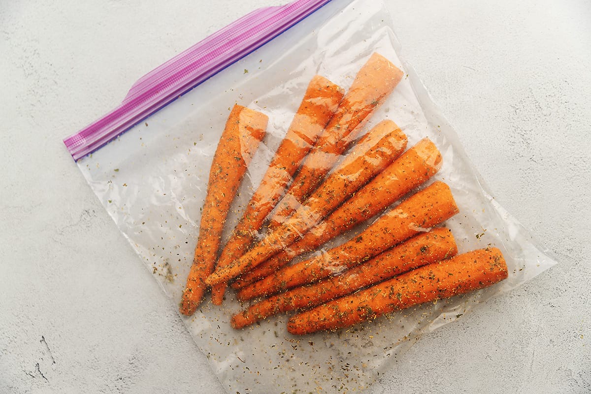 carrots and seasonings in a zip-top bag
