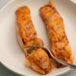 bang bang salmon on a white plate