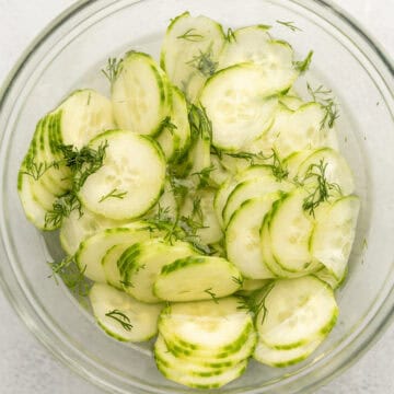 German cucumber salad in a glass bowl