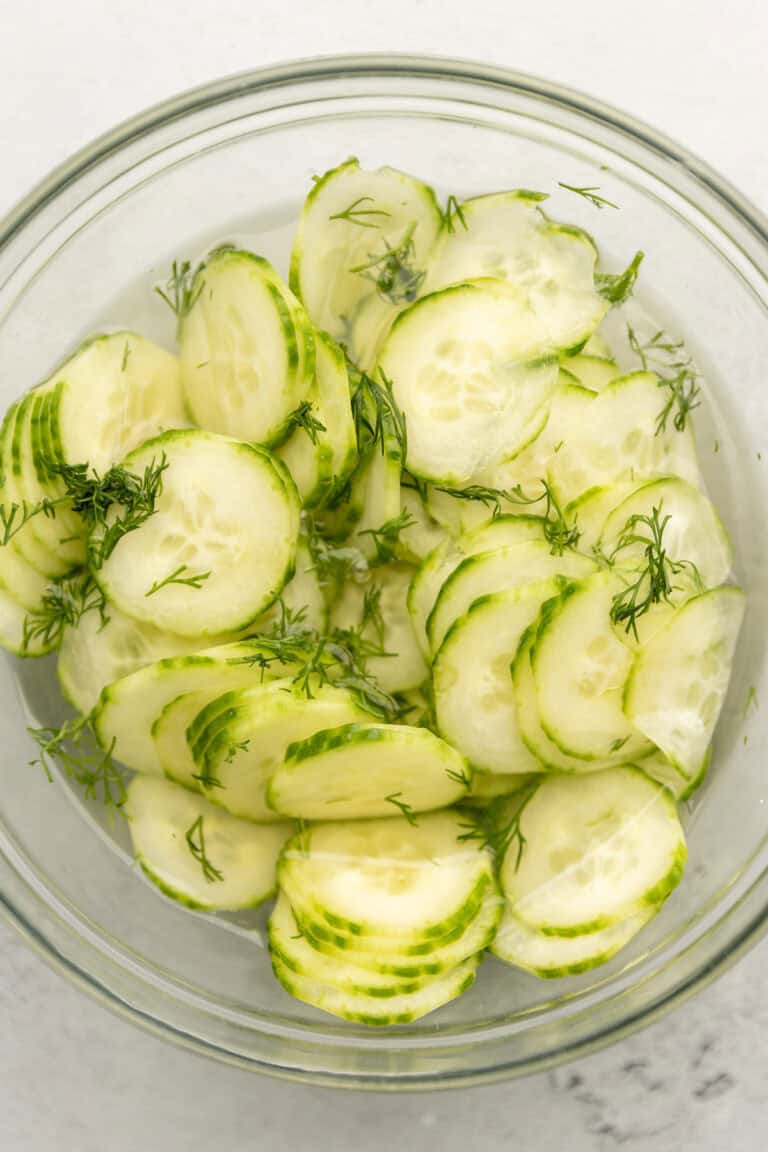 German cucumber salad in a glass bowl