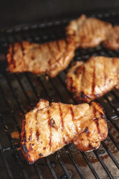 Teriyaki chicken thighs on a grill