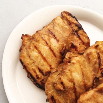 grilled teriyaki chicken on a platter