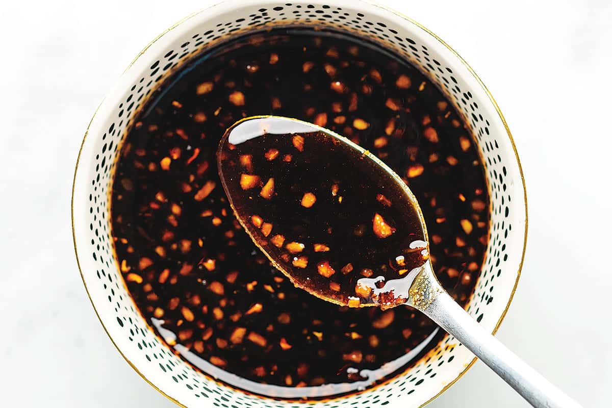 a bowl full of teriyaki chicken marinade