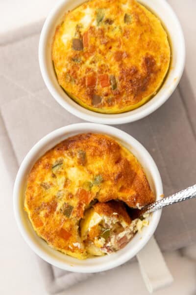 2 egg bakes in white ramekins