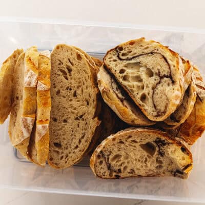 sliced sourdough bread in a bread box