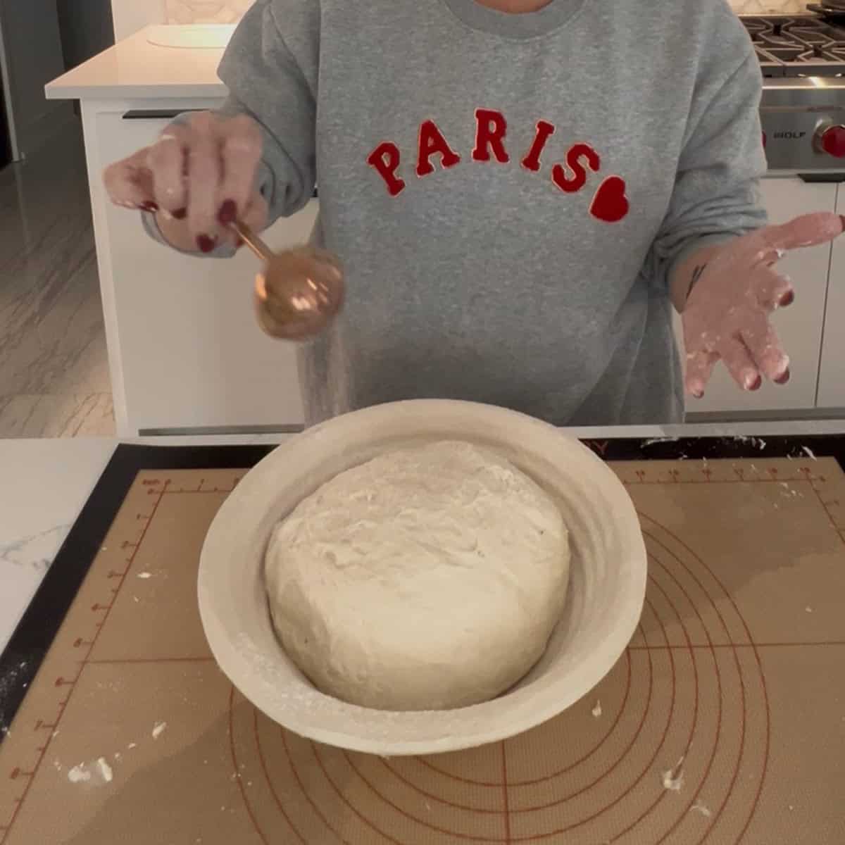 putting sourdough in a banneton basket