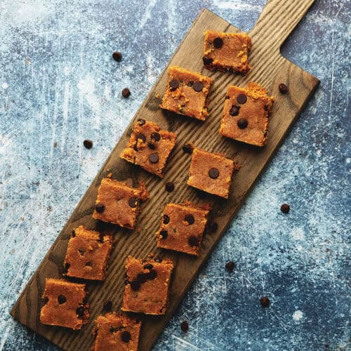 protein bites on a wood serving board