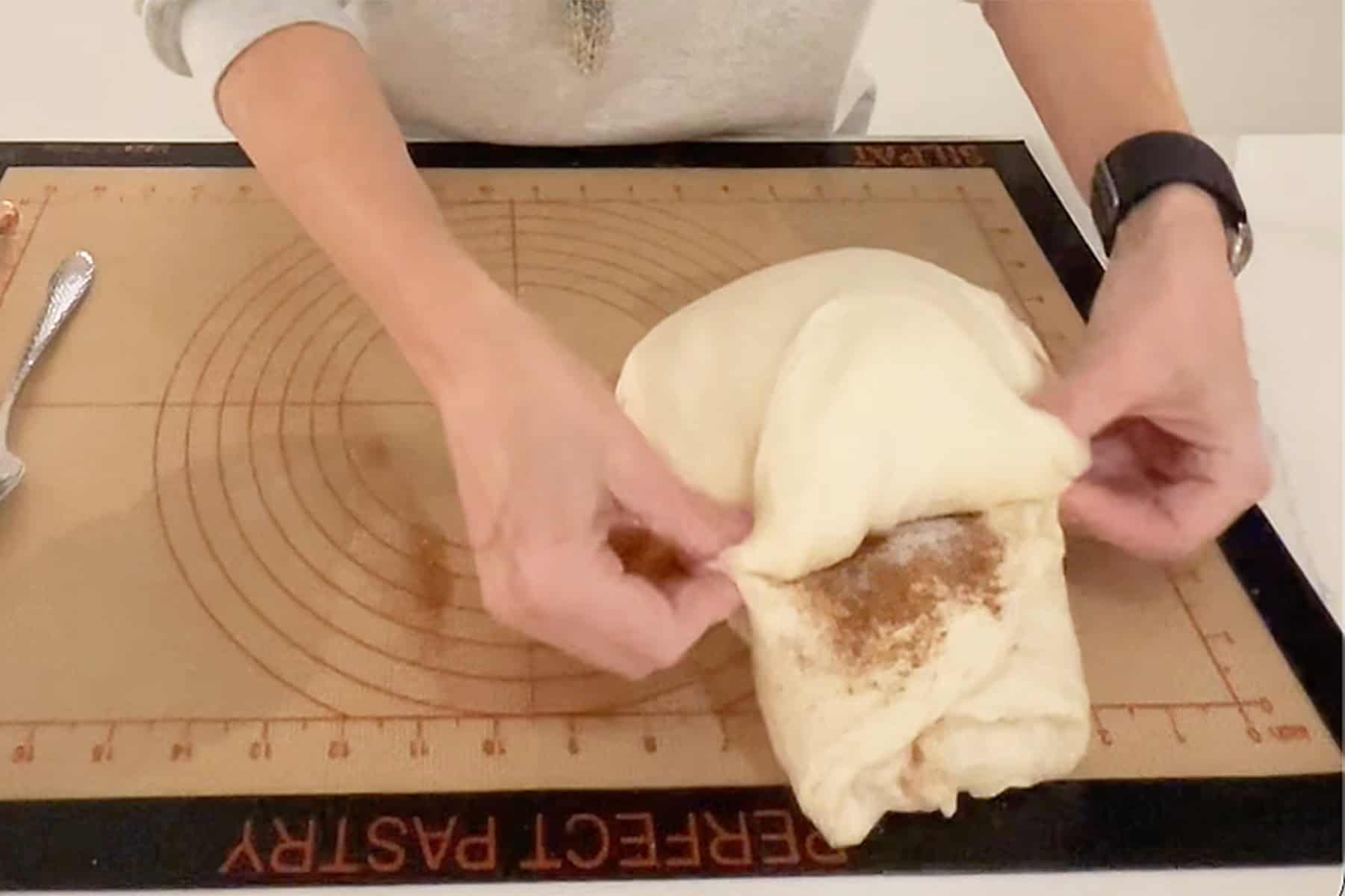 rolling cinnamon and sugar sourdough 
