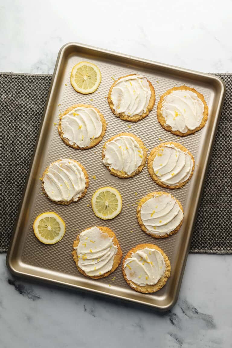 keto lemon cookies on a sheet tray