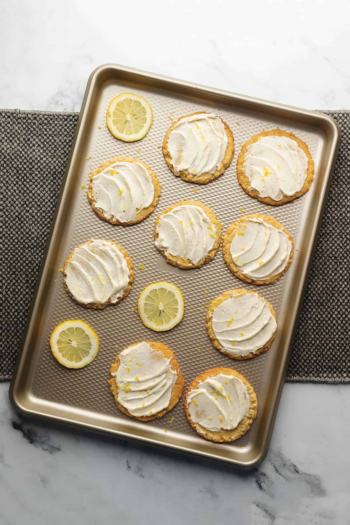 keto lemon cookies on a sheet tray