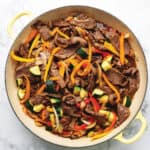 teriyaki beef stir fry in a large skillet