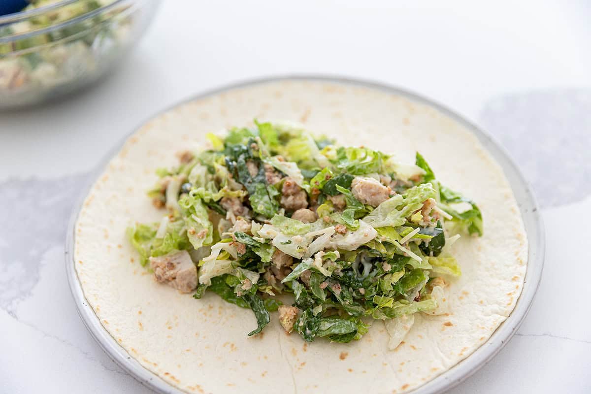 caesar salad portioned out on a wrap