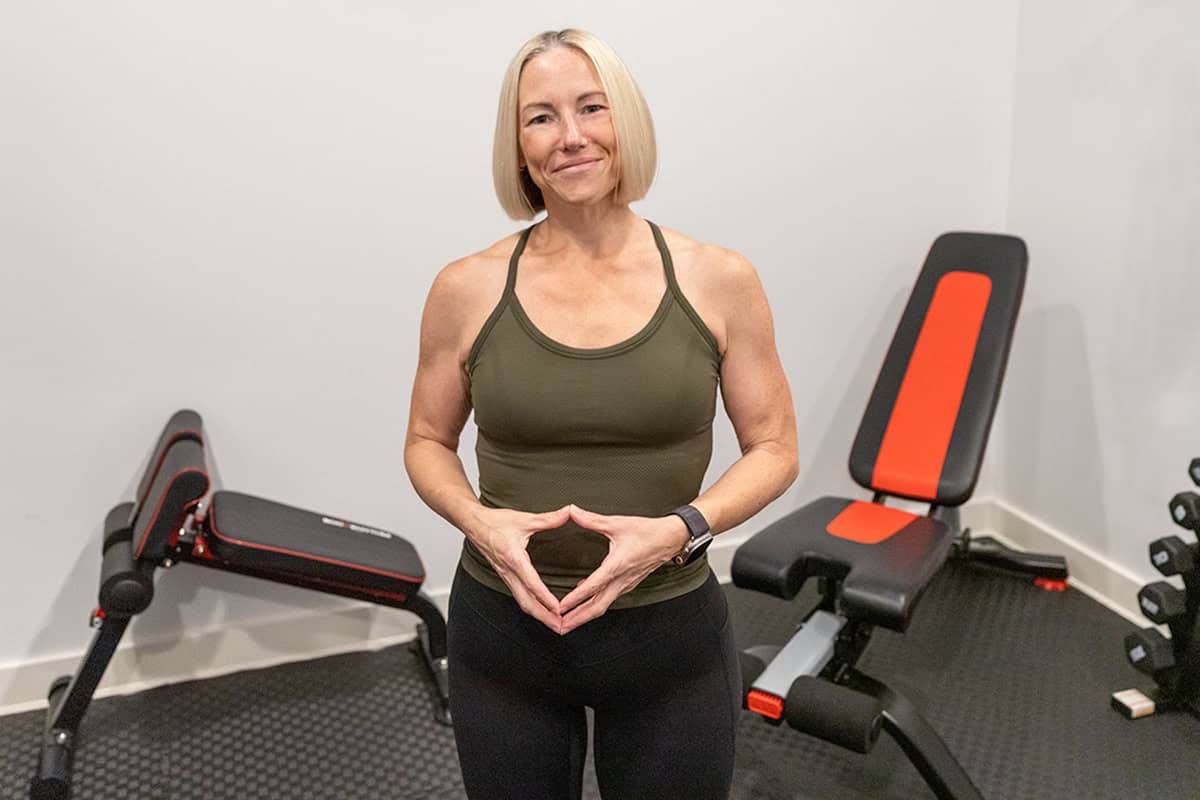 Jennifer Banz standing in her home gym
