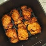 air fryer boneless skinless chicken thighs in the basket