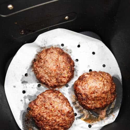 3 burgers cooked in an air fryer
