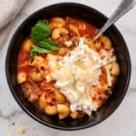 high protein lasagna soup in a bowl with cottage cheese