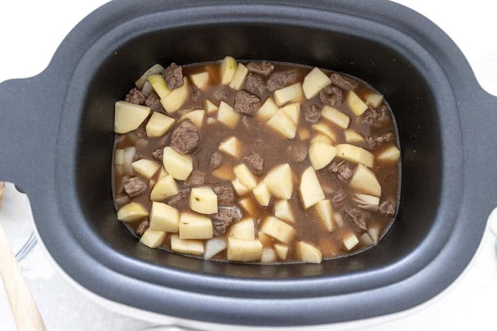 potatoes beef and broth in a slow cooker